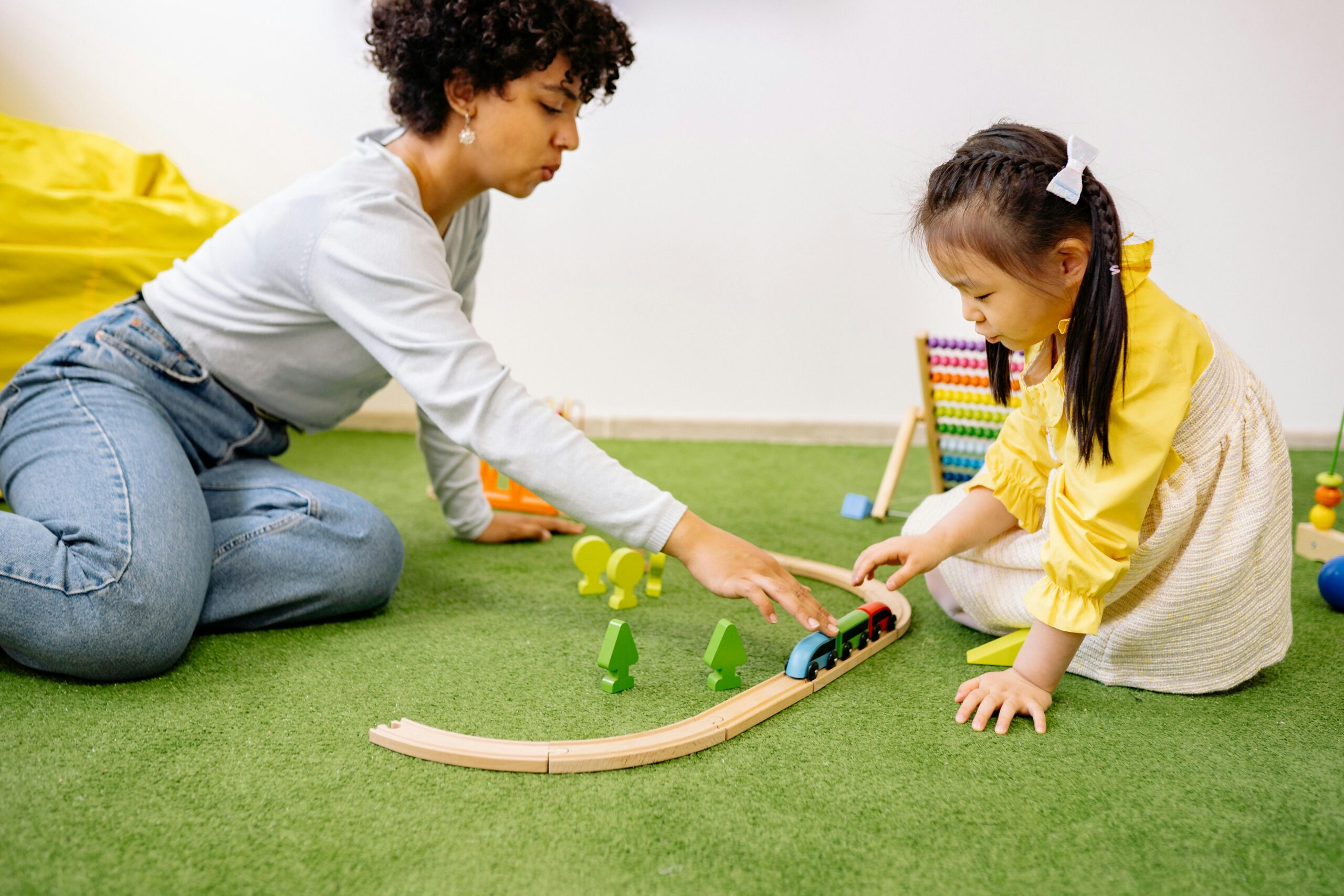 Woman playing with child