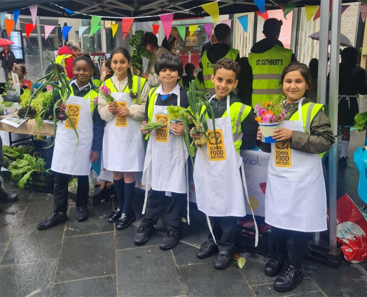 Children with their own fruit and veg