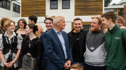 St John Rigby College students celebrate with principal Peter McGhee