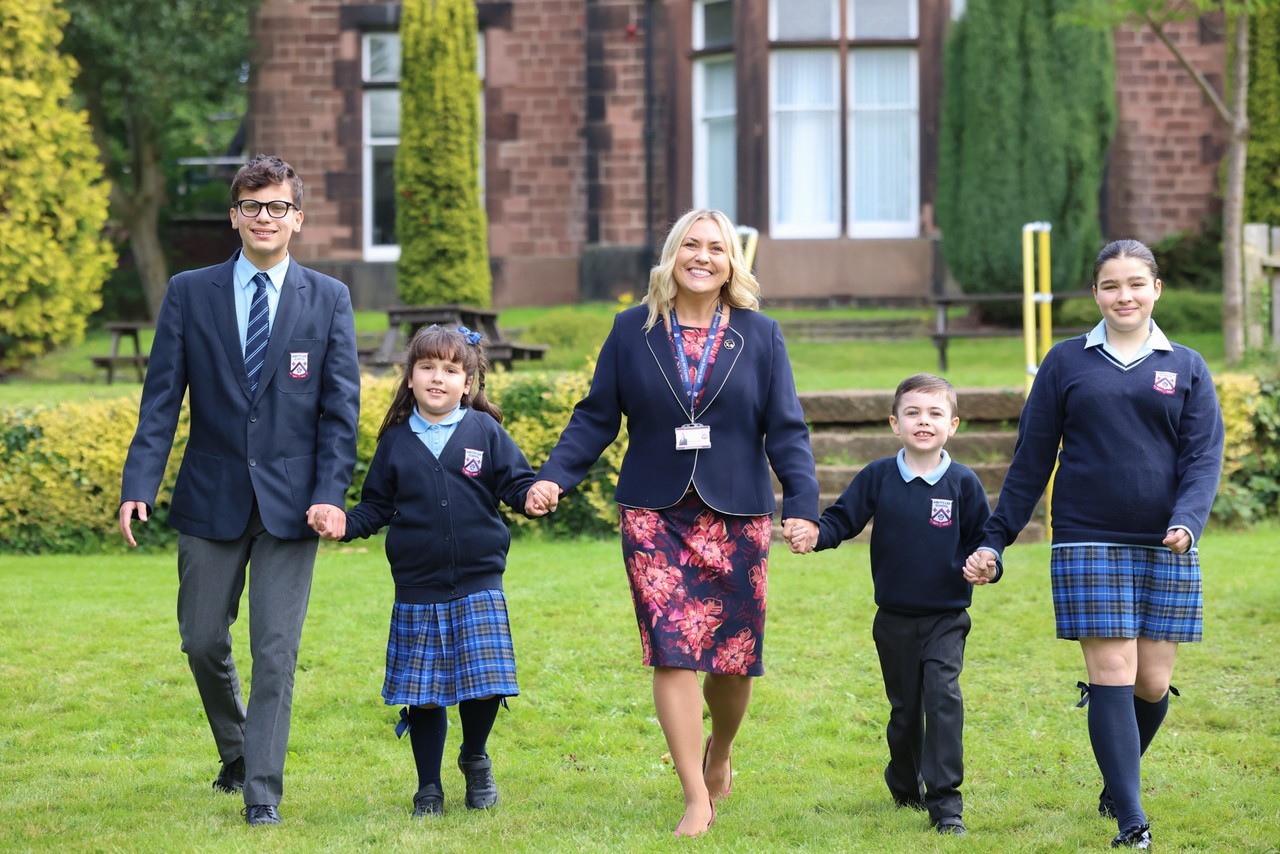 Abbot's Lea School headteacher, Mrs Ania Hildrey, with students