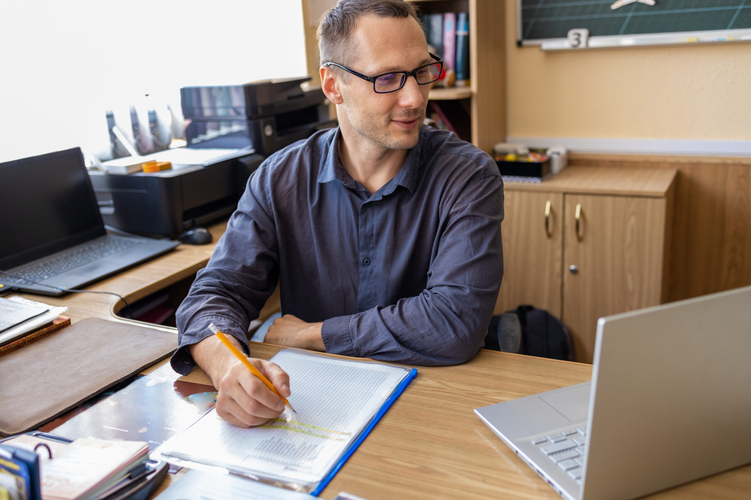 Teacher on laptop