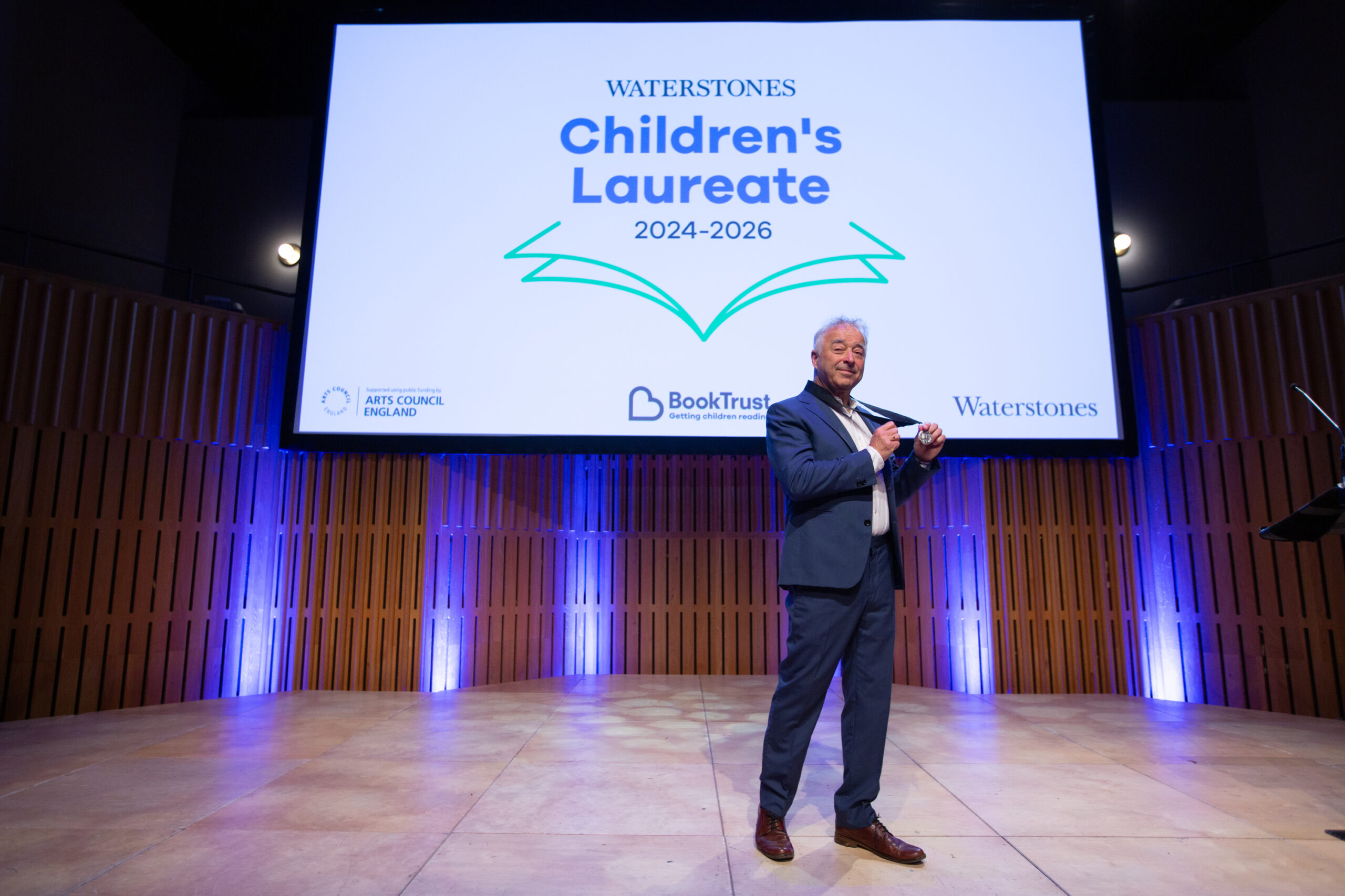 Frank Cottrell-Boyce revealed as the new Waterstones Children’s Laureate 2024-2026, at a ceremony in Howard Assembly Room, Leeds on 2 July 2024 – organised by BookTrust, the UK’s largest children’s reading charity.