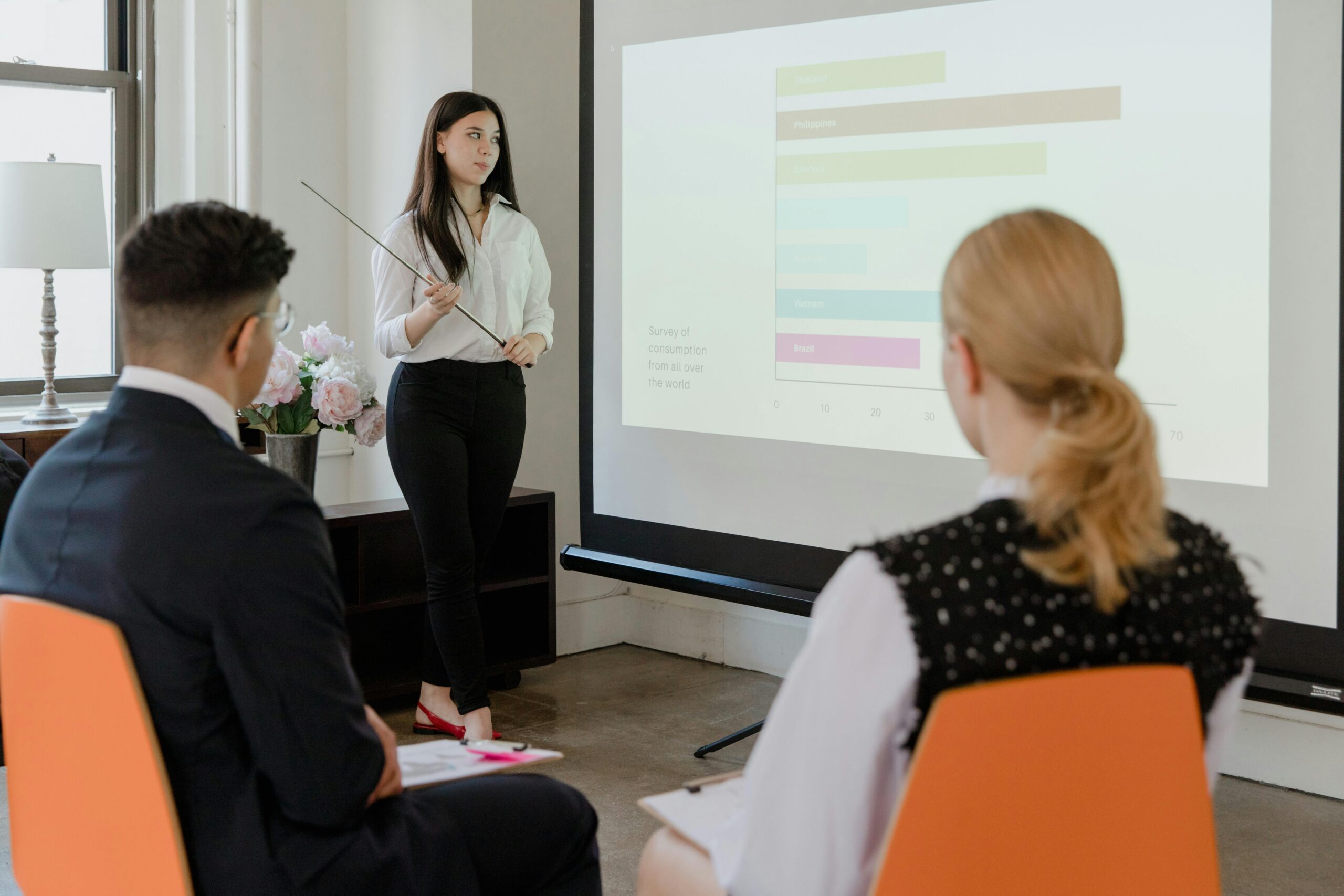 Young person giving presentation at work