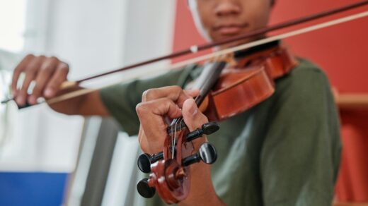 Teen playing violin