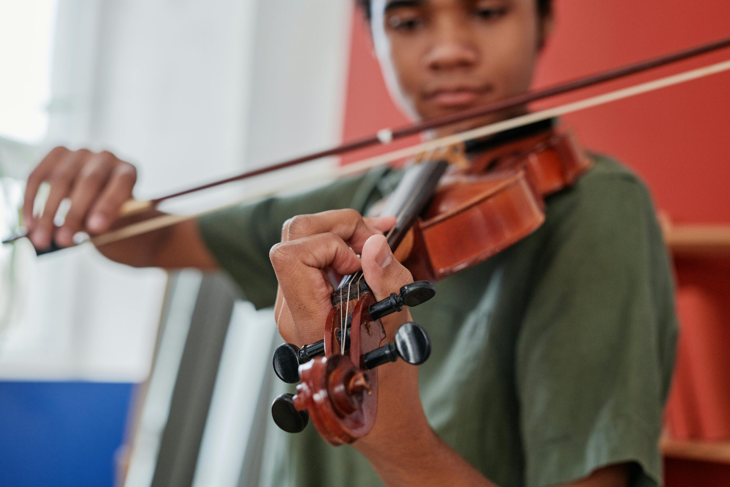 Teen playing violin