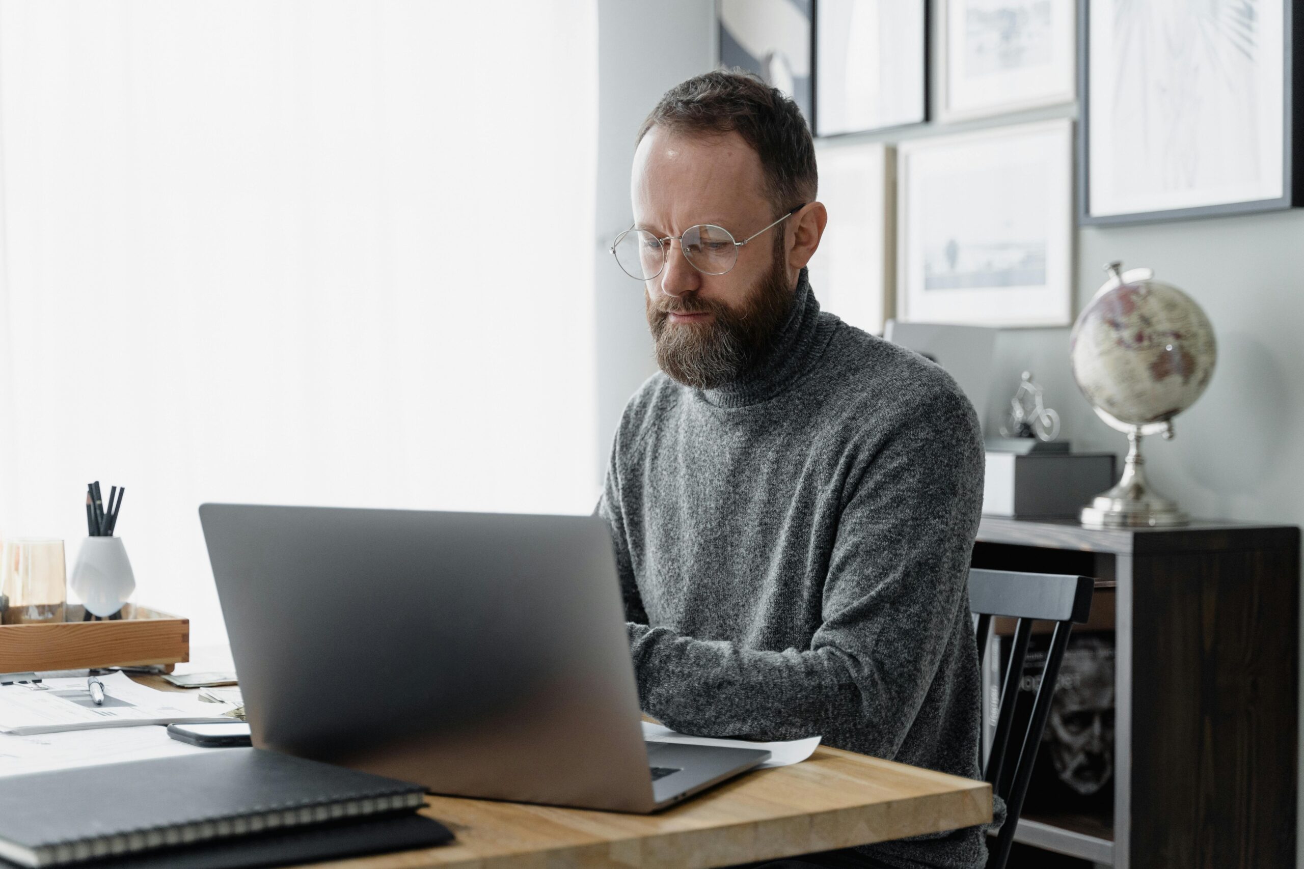 Man on computer at desk